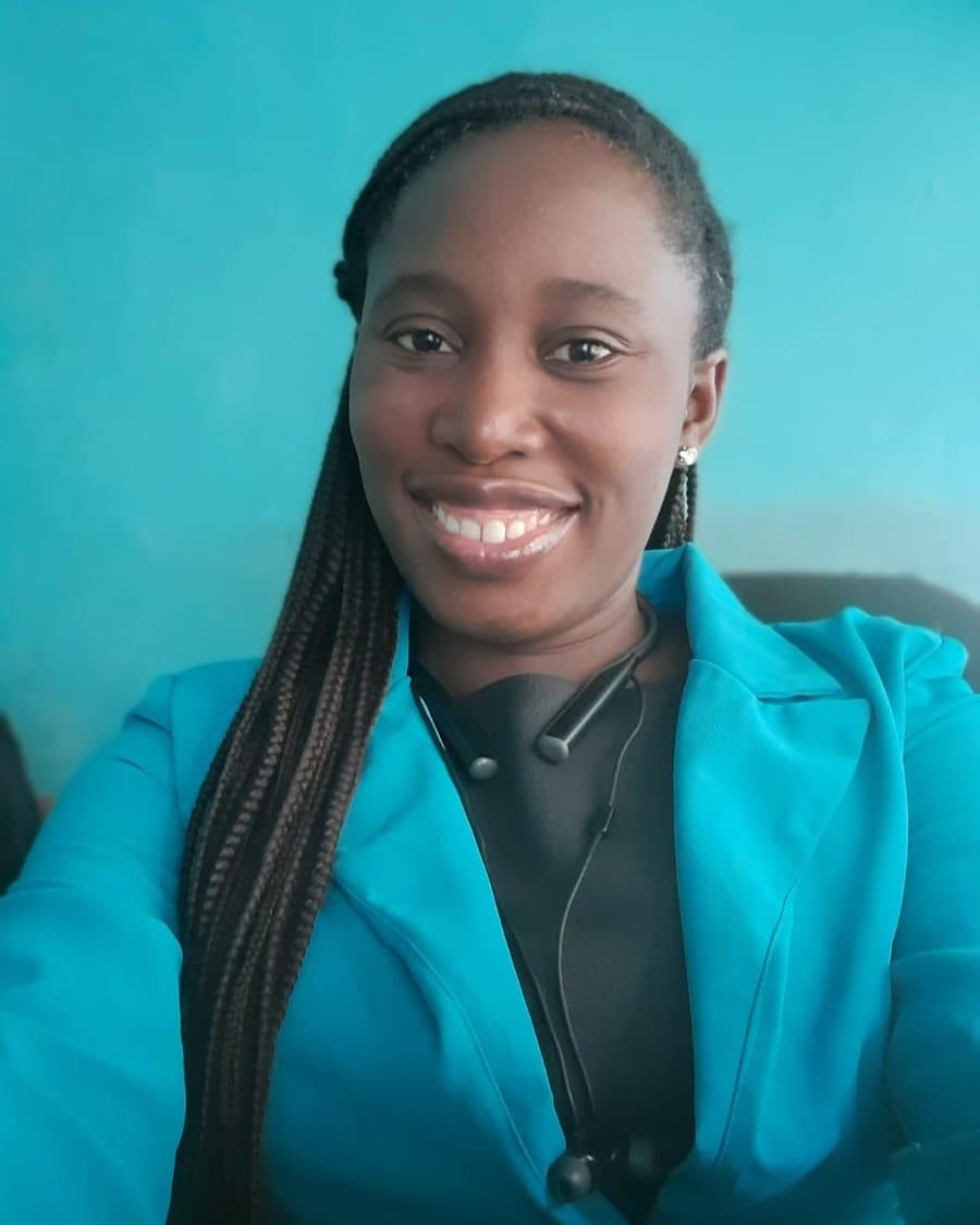 Dr. Jumoke Adebayo, English Language Specialist